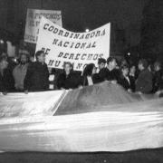 Protesters holding signs