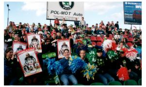 Audience at a stadium watching a sports game